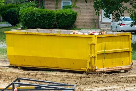 Large iron dumpster garbage outdoor steel metal trash full Stock Photos