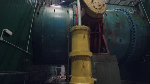 Large iron technical pipe in hydroelectric power plant with gate valve to shut Stock Footage 247245905