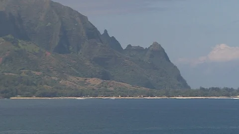 Large island mountain range. By ocean. zoom out Video stock 102525868