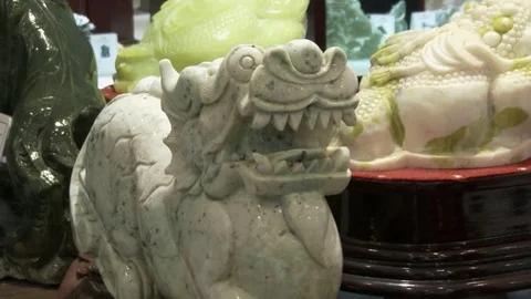 A large jade mythical animal in upscale jade shop in China, 4K. Stock Footage 79700832
