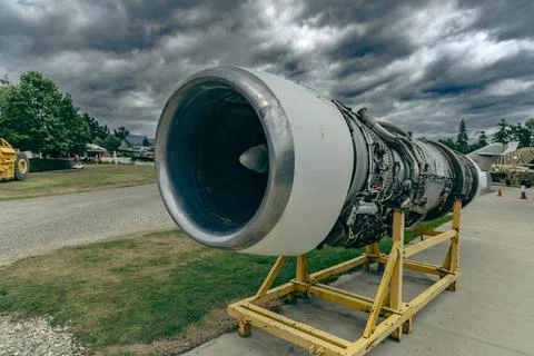 Large Jet Engine Display Outdoors Under Clouds 스톡 사진