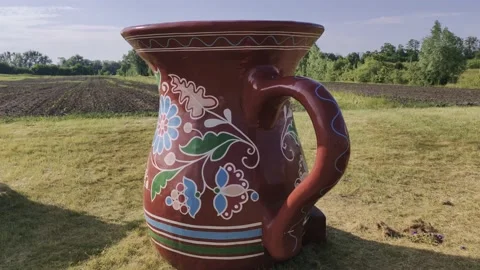 Large jug in the countryside Stock Footage 134451798