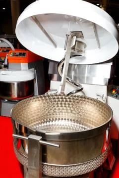 Large kneading machine for preparing dough and various food mixtures. Stock Photos