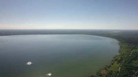 A large lake with a drone Stock Footage 237116707