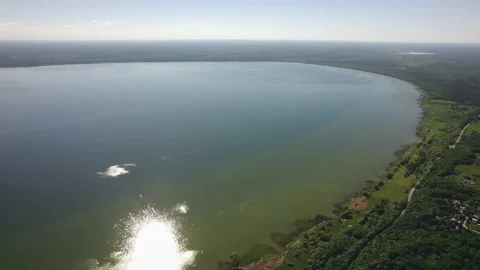 A large lake with a drone Stock Footage 237116720