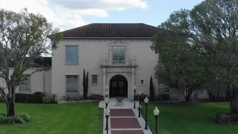 A large lawn in front of a house Stock Footage 155458105