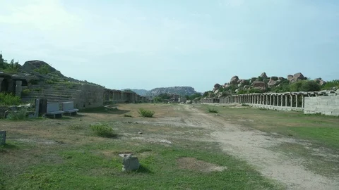 Large lawn within ancient stone structures of historical importance. 動画素材 105287327