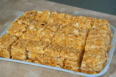 A large layer cake prepared by a chef in a restaurant for eating Stock Photos