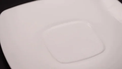 Large leaf tea is poured on a white saucer, black tea Stock Footage 75478152