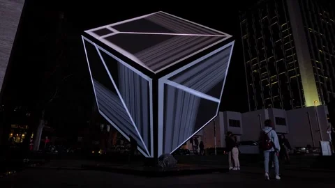 Large LED cube with colorful abstract visual show on screen walls: immersive art Stock Footage 339777722