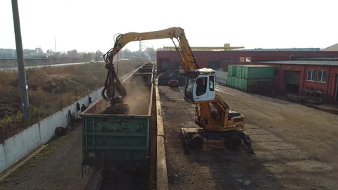 Large lifting crane with manipulator. A wagon on railroad. Stock Footage 99333676