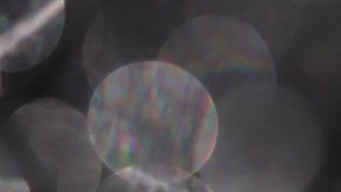 Large light bokeh in the dark Vídeo Stock 318918279
