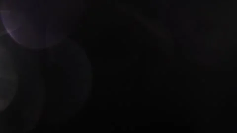 A large light shining from the left in the darkness. Stock-Footage 318919691