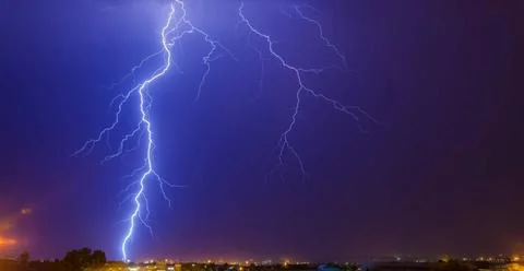Large Lightning Strike to ground Large Lightning Strike from cloud to grou... Stock Photos