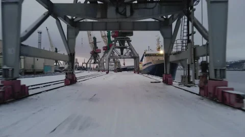Large loading rail cranes on the pier on the beach. Cool industrial landscape 스톡 동영상 144848321
