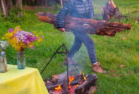 Large log for making a campfire in the evening Stock Photos