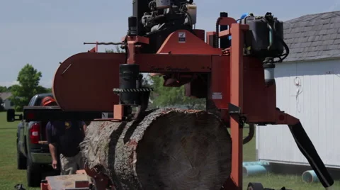Large log on portable sawmill front angle Stock Footage 40472110