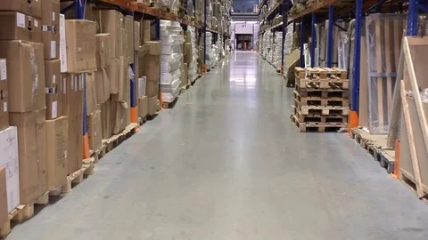 Large Logistics hangar warehouse with lots shelves or racks with pallets of Stock Footage 100982988
