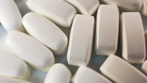 Large long tablets in a shiny shell move smoothly from left to right. Stabilizat Stock Footage 144643417