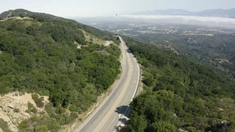 A large long train on a mountain road Stock Footage 155460004