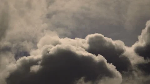 Large Looming Ominous Clouds with High Contrast Rising Fast in Real Time. Stock Footage 340188065