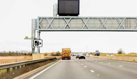 A Large Lorry Designed For Carrying Huge Logs From Forest To Factory Drivin.. Stock Photos