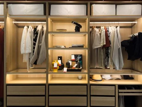 Large luxury men's wardrobe with different clothes, shoes and accessories, .. Stock Photos