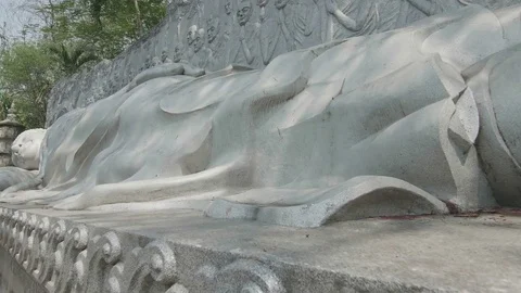 Large lying buddha sculpture close-up Stock Footage 73504109
