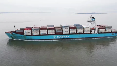 Large maersk container ship glides steadily across dutch waterway bright Stock Footage 328201538