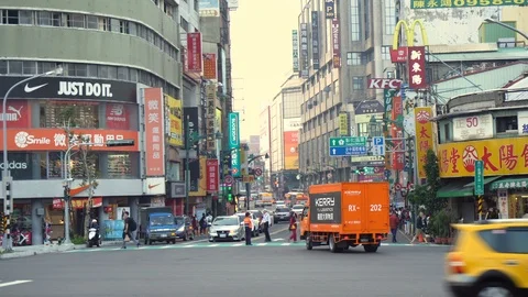 Large Main Road With Multiple Stores in Central Taichung, Taiwan Video stock 106060090