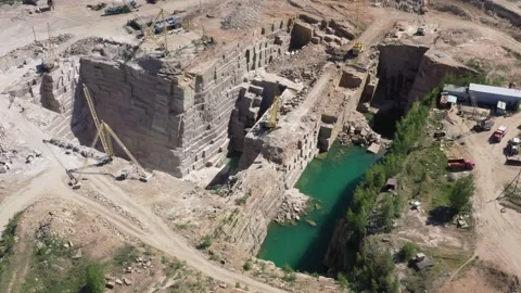 Large marble quarry with turquoise water Stock Footage 239103680