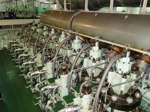 Large Marine Engine Room with Eight Cylinder Diesel Engine Units Stock Photos