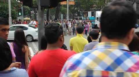 Large mass of people at street intersection Video stock 24851720