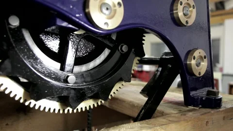 Large Mechanical Tower Clock Gears and Mechanism in Workshop Stock Footage 345753277