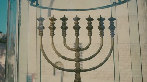 A large menorah behind the glass in the square in Jerusalem Video stock 231885459