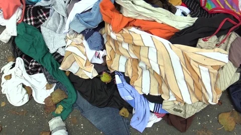 Large mess of things containers secent hand to collect used clothing Video stock 81667873