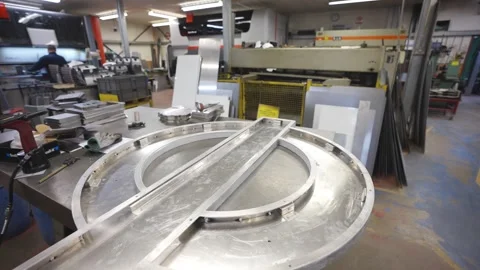 A large metal object is sitting on a table in a factory Stock Footage 302457142