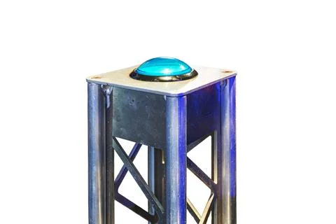 Large metallic cylindrical structure with grid pattern, vibrant blue dome, ar 스톡 사진