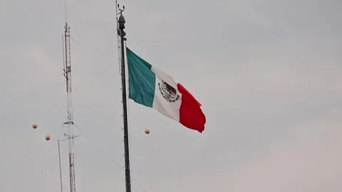Large Mexican Flag Waving On Tall Flagpole Overcast Mexico City Zocalo Sky Stock Footage 344716119