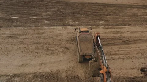 Large mining dump truck. Loading stone into a dump truck. Mineral production Video stock 151862266
