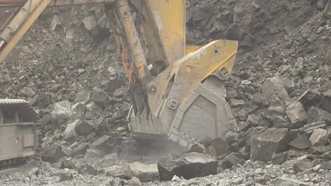 Large mining excavator extracts rock. Mining industry Stock Footage 211412138