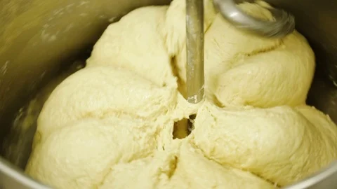 Large mixer mixes the flour in bread dough Stock Footage 69778228
