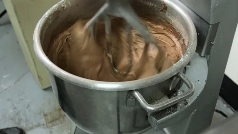 Large mixer running high speed then stopped for test of frosting Stock Footage 94248740