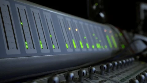 Large mixing console in the recording Studio, close-up shot equalizer Stock Footage 107146572