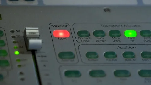 Large mixing console in the recording Studio, close-up shot of the Record button Stock Footage 107192930