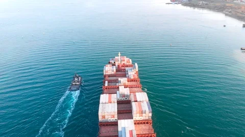 Large modern container ship arrives at port of discharge - Top down Aerial Stock Footage 106662117