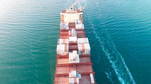 Large modern container ship arrives at port of discharge - Top down Aerial Stock Footage 106662257