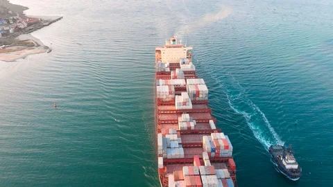 Large modern container ship arrives at port of discharge - Top down Aerial Stock Footage 106662377