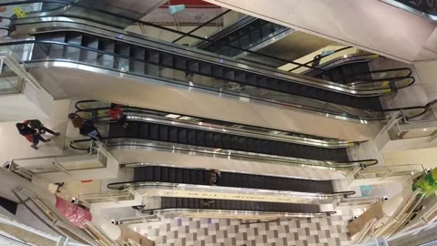 Large modern escalator in subway. Deserted escalator without people on four lane Stock Footage 147516238