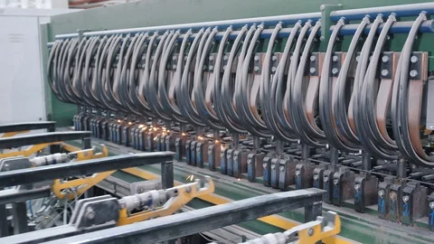 Large modern factory machine welds metal rebar carcass Stock Footage 124299158